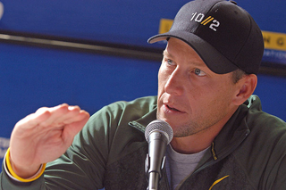 Illustration for article titled Over-Competitive Lance Armstrong Challenges Cancer To Rematch